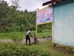 Cegah Penangkapan Ikan Ilaran, Bhabinkamtibmas Desa Lebani Pasang Baligho Himbauan